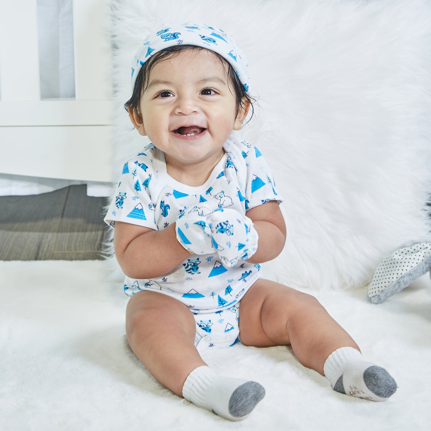 EVERYDAY KIDS 4 Pack of Baby No Scratch Mitten Pairs for Newborns and 4 Pack Baby Boy Hats; Newborn Hats for Boys in Light and Dark Solid Blue and Prints with Stripes and Woodland Fox and Bear Animals