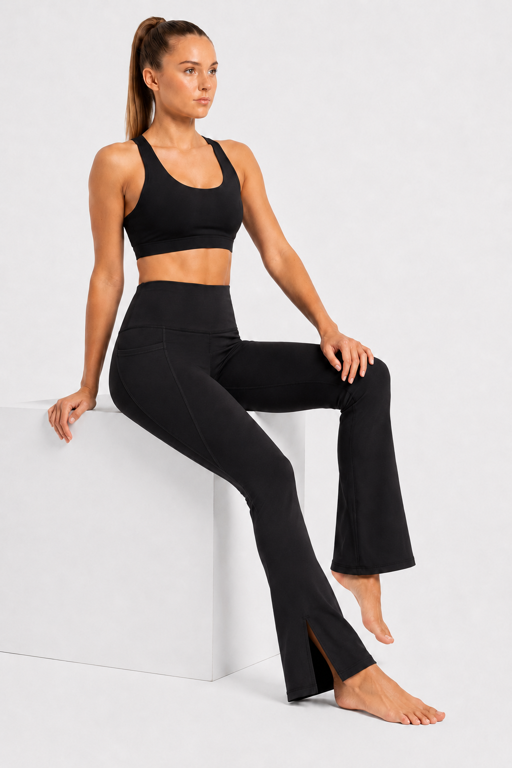 New York Laundry Women's High-Waisted Flare Yoga Pants with Side Pockets and Hem Slits, Jet Black